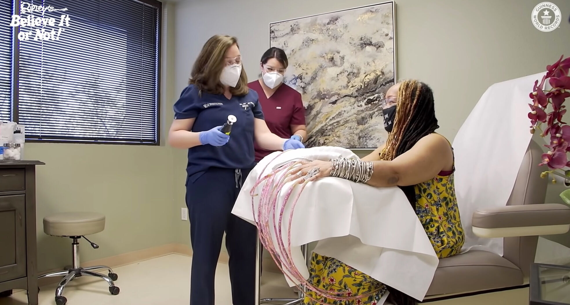 Woman with the world's longest nails cuts them after nearly 30 years
